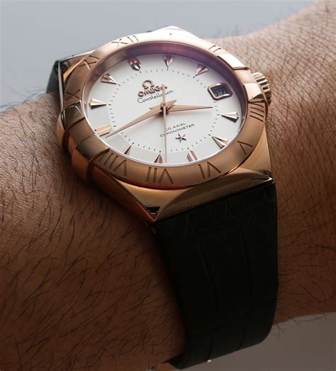 omega constellation homage|omega constellation logo review.